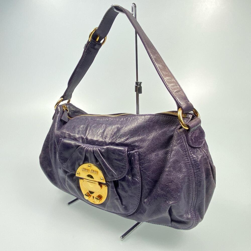 Miu Miu purple textured leather shoulder bag front pocket